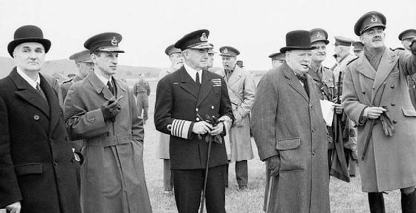 Lindemann (left) and Churchill (second from right)