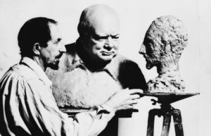 The sculptor admires Churchill’s bust of Nemon himself