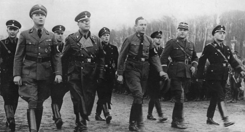 Albrecht Forster (center, hatless) and other Nazi commissioners in occupied Poland